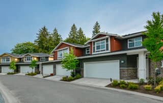 Street of brand new residential triplex houses ready for moving in.