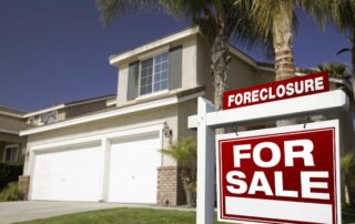 Foreclosure home for sale sign
