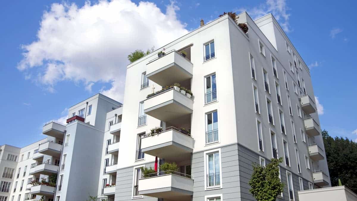 Multi-Family Property Investments Scaling with Hard Money Modern apartment building with balconies